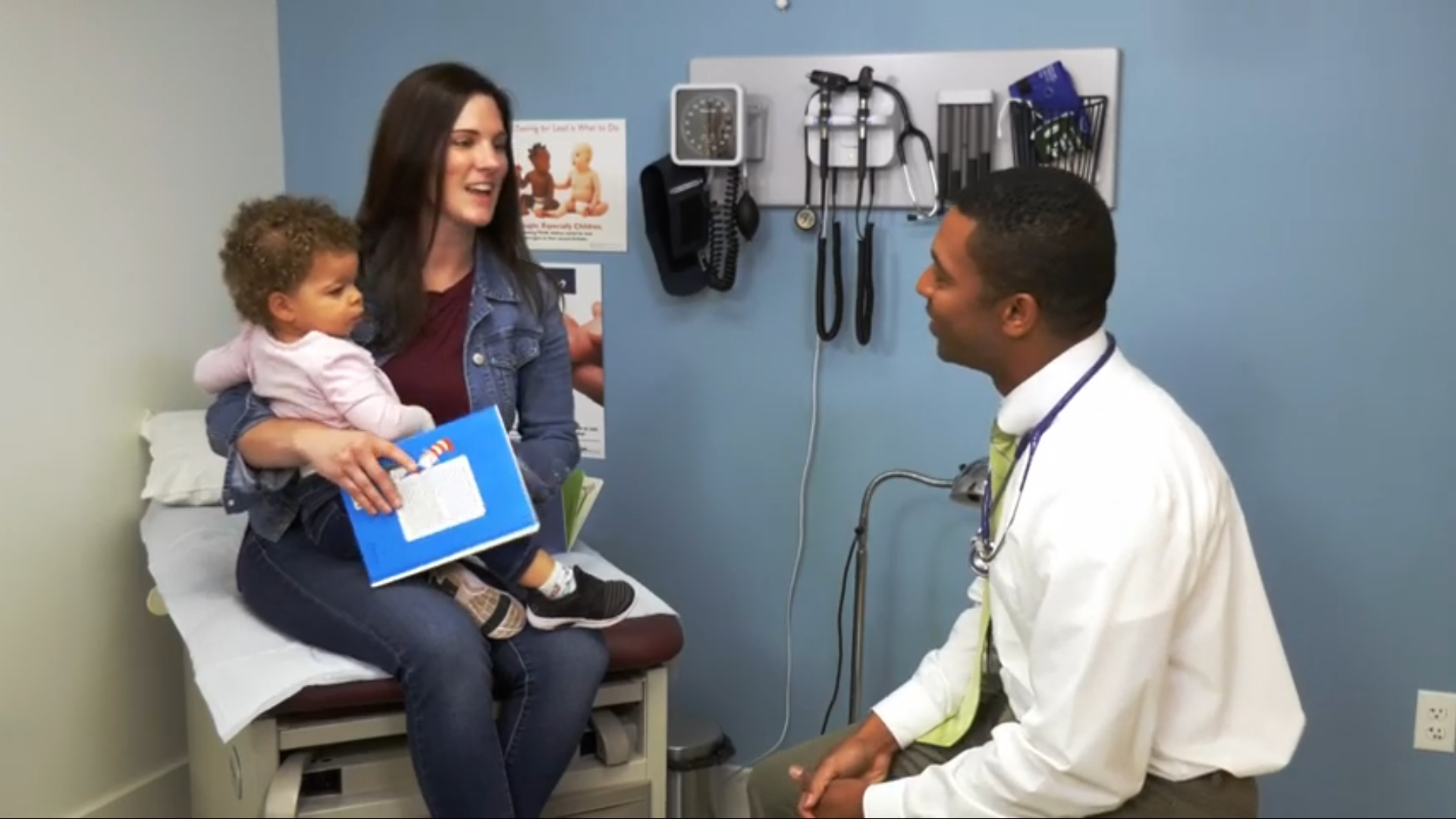 Parent talking to doctor about testing her baby for lead.